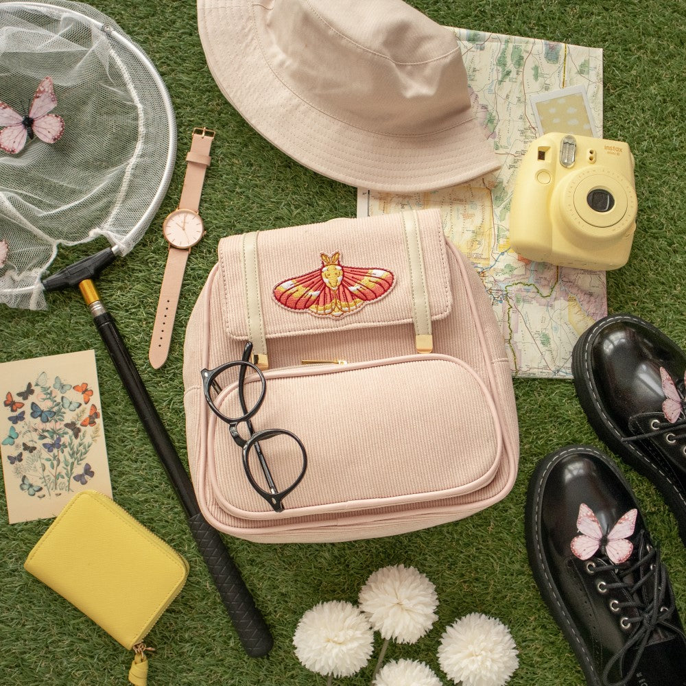 Flatlay of Rosy Maple | Corduroy Everyday Bag in pink with accessories
