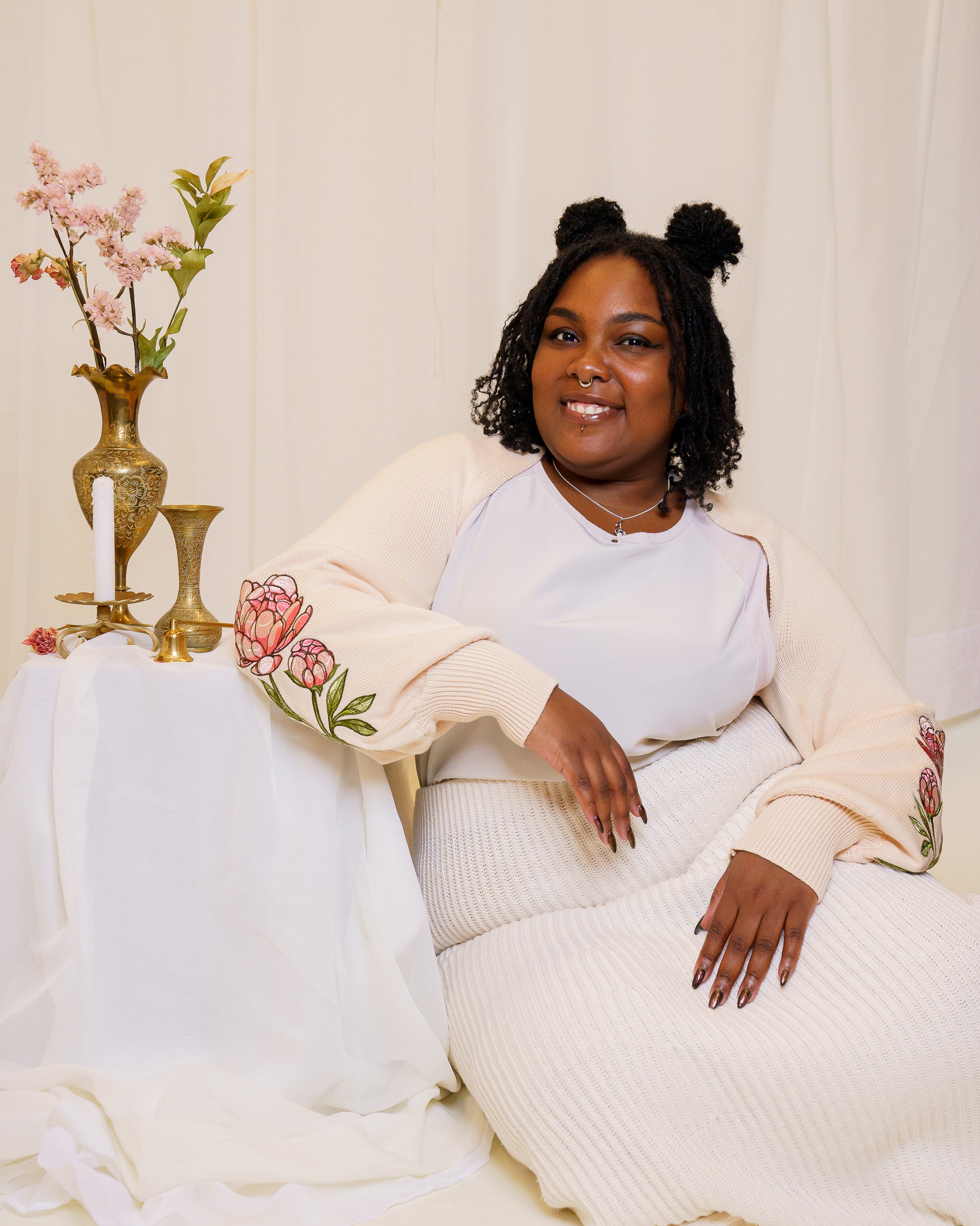 Woman wearing bashful cream bolero in size extra large.