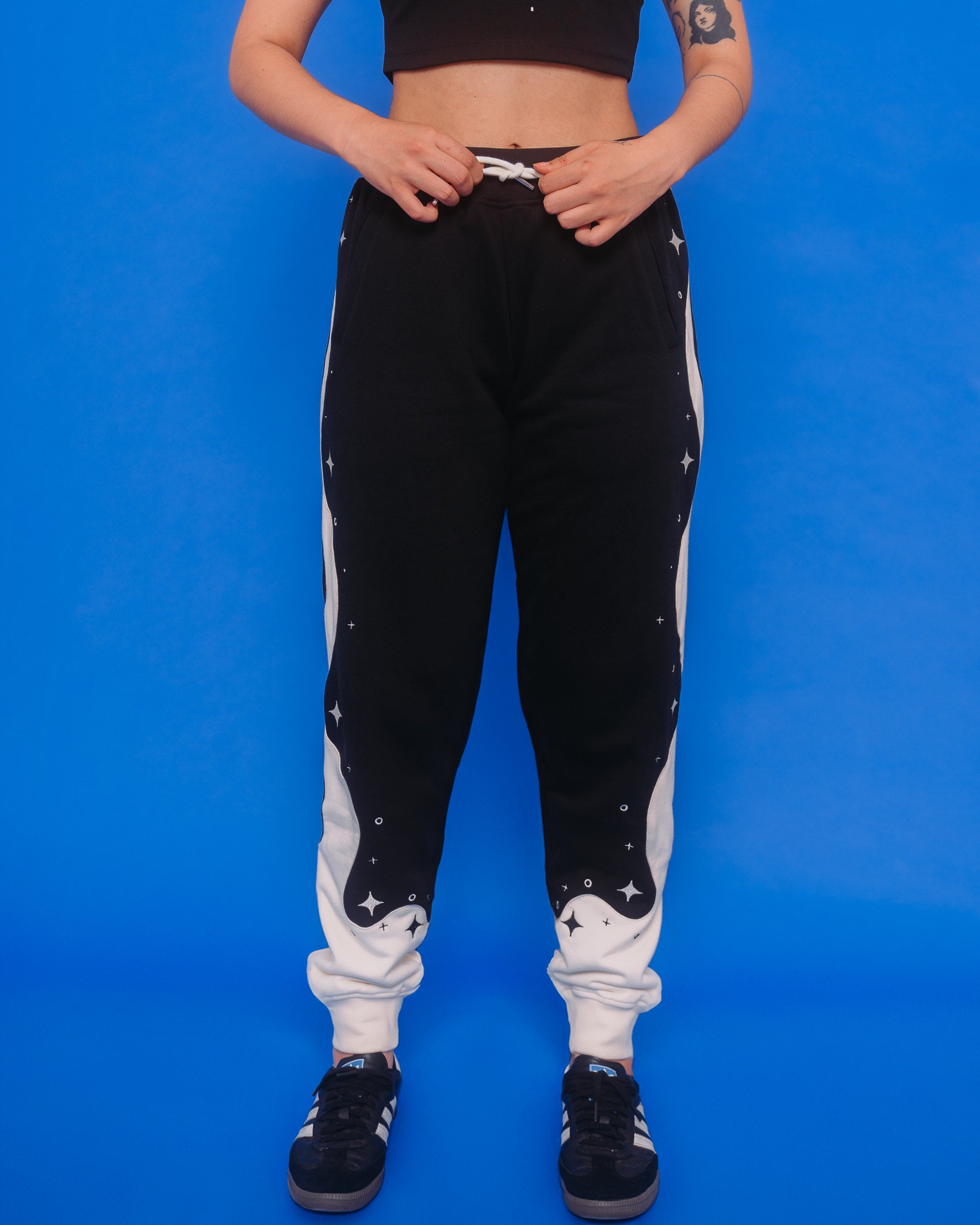 Front view of deep space joggers in front of blue background.