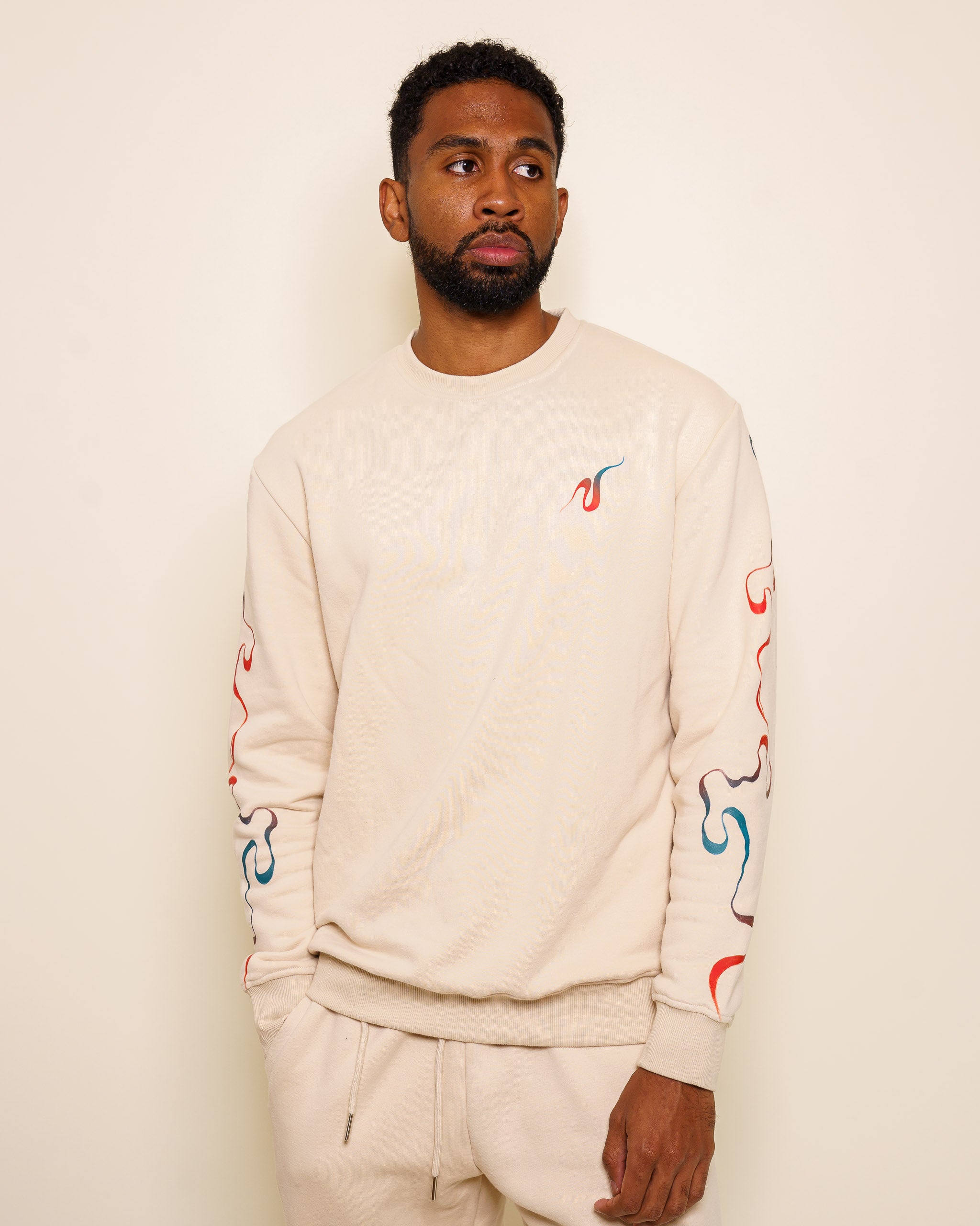 man wearing intuition crewneck in size large.