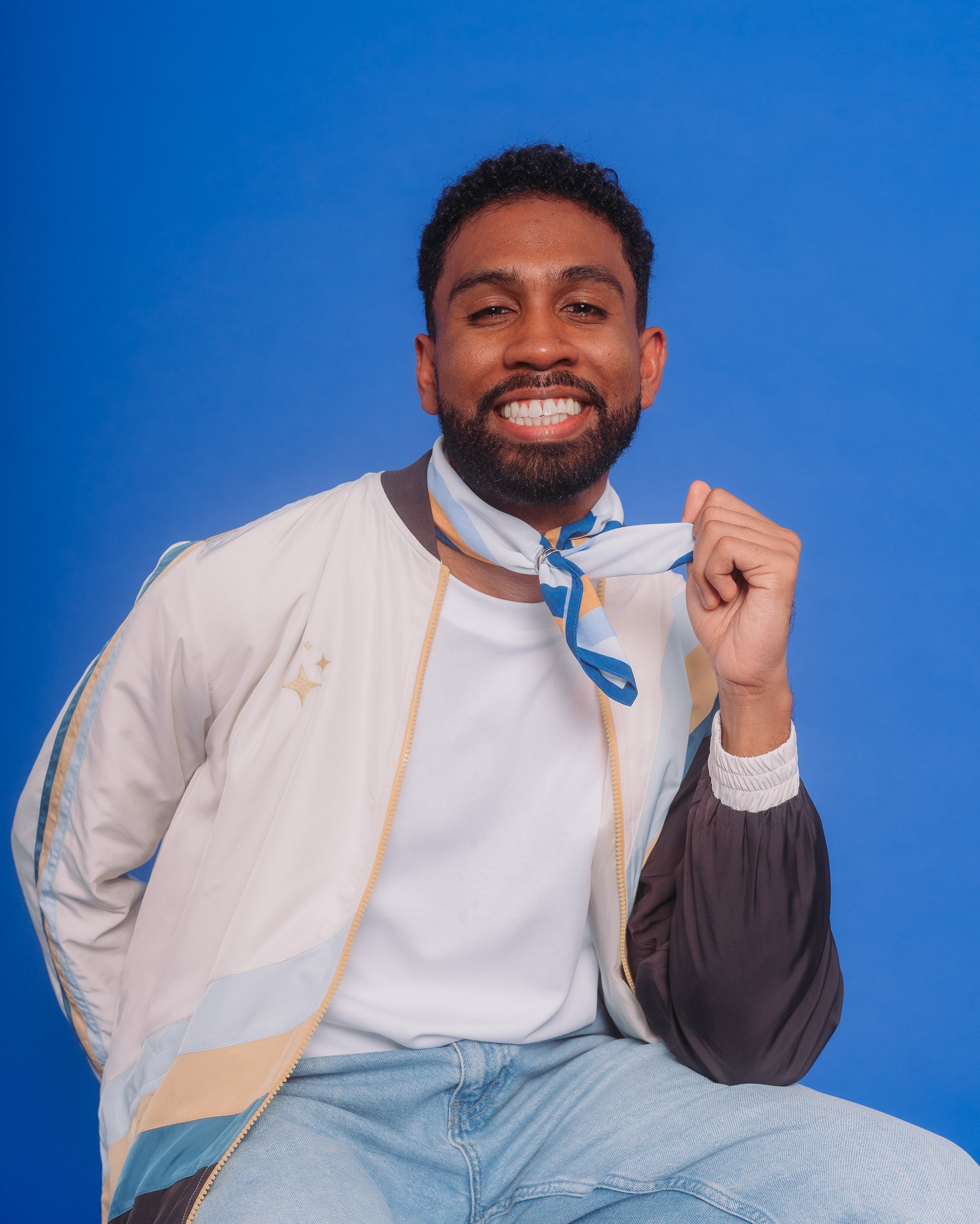 Man wearing milky way bandanna around neck.
