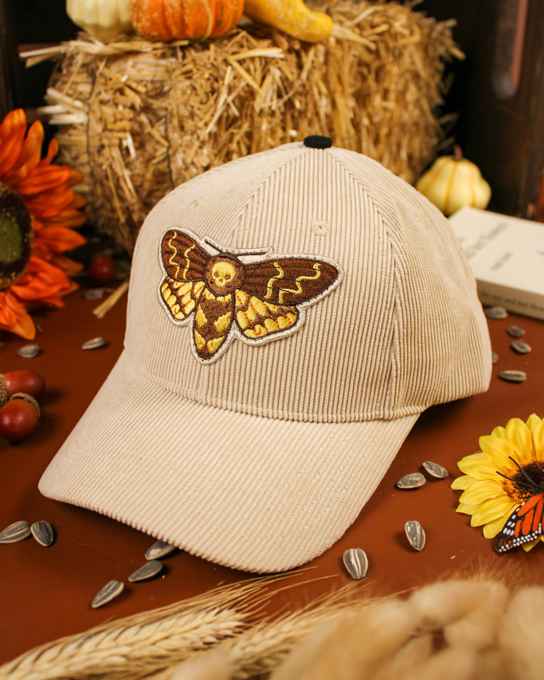 Death's head moth cap in beige.